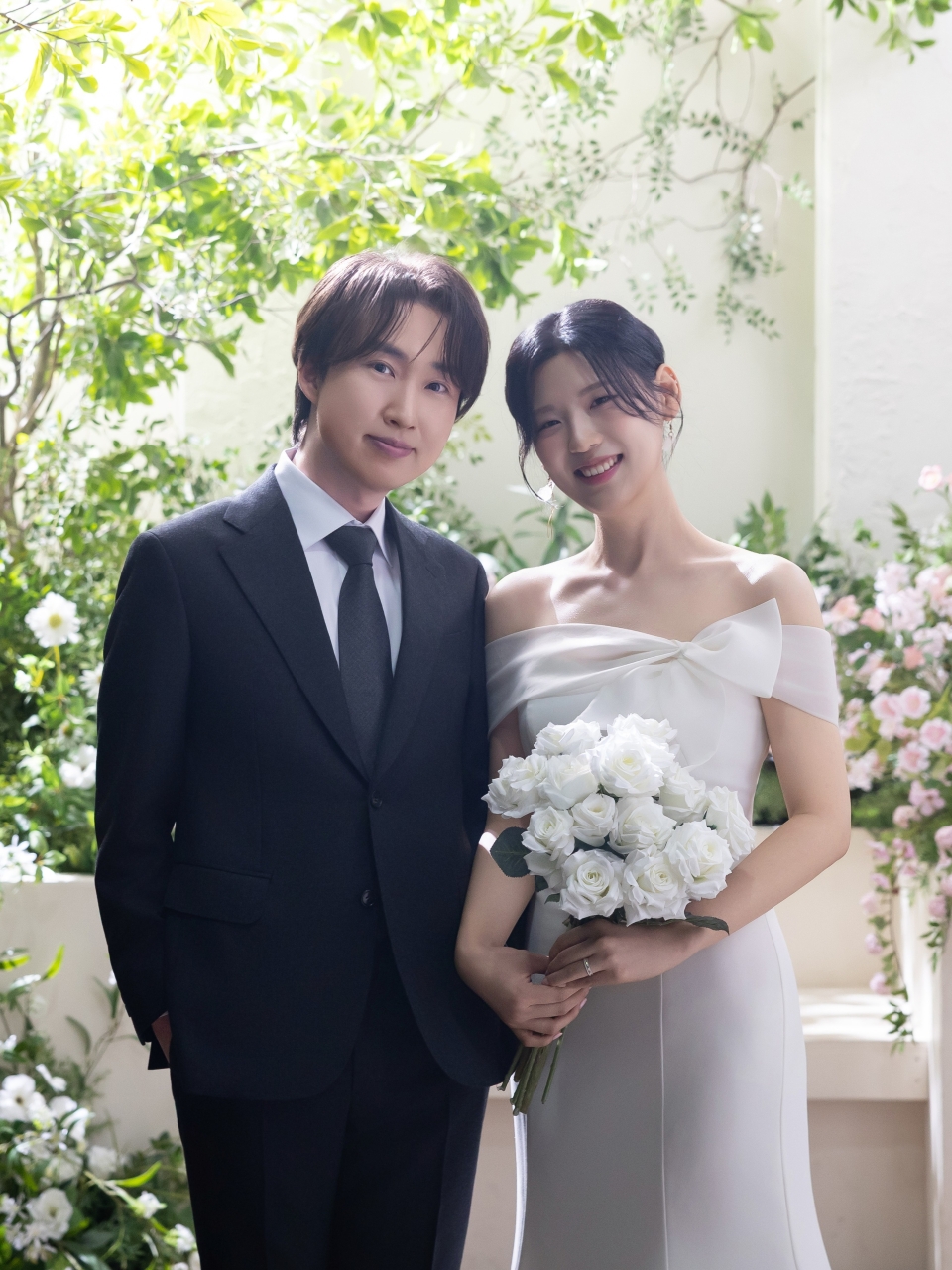 A beautiful photo of the couple, smiling happily.